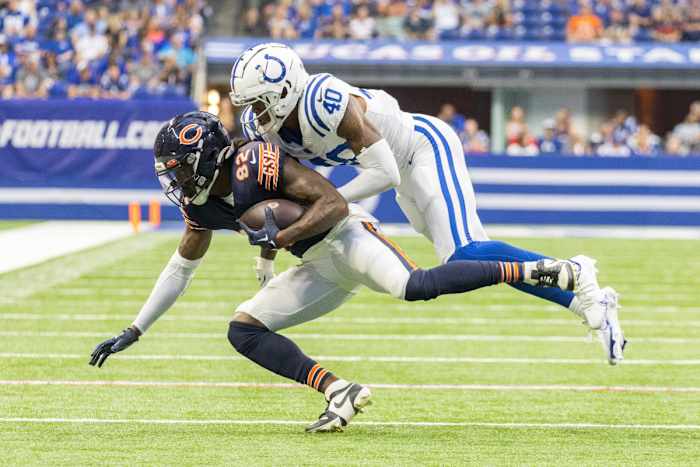 Aug 19, 2023; Indianapolis, Indiana, USA; Chicago Bears wide receiver Daurice Fountain (82) catches the ball while Indianapolis Colts cornerback Jaylon Jones (40) defends in the second quarter at Lucas Oil Stadium. Mandatory Credit: Trevor Ruszkowski-USA TODAY Sports